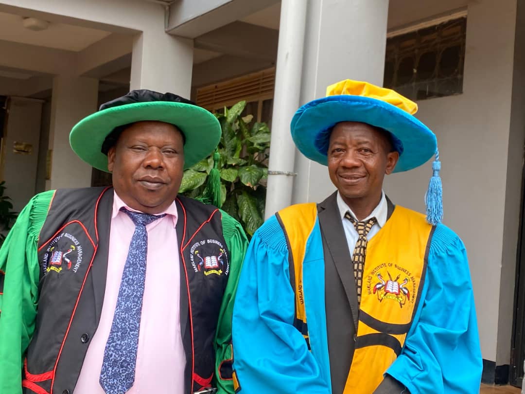 Makland Institute faculty members in graduation regalia